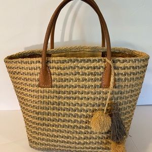 BUJIBAJA elegant Tan & Grey woven straw bag with coffee colored leather handles.